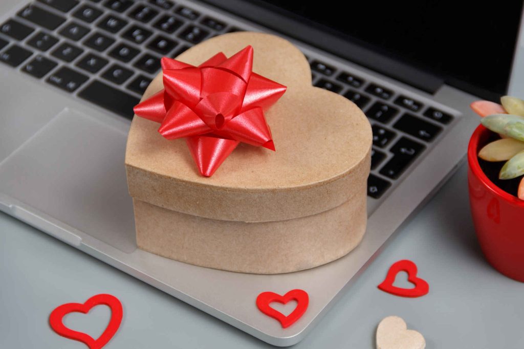 Valentines day gift box on laptop.
